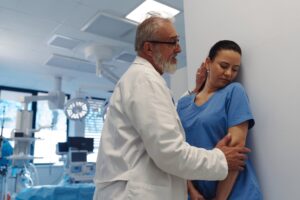 Inappropriate behavior between senior doctor and female nurse. Workplace harassment.