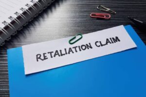 Retaliation claim writting on table background.